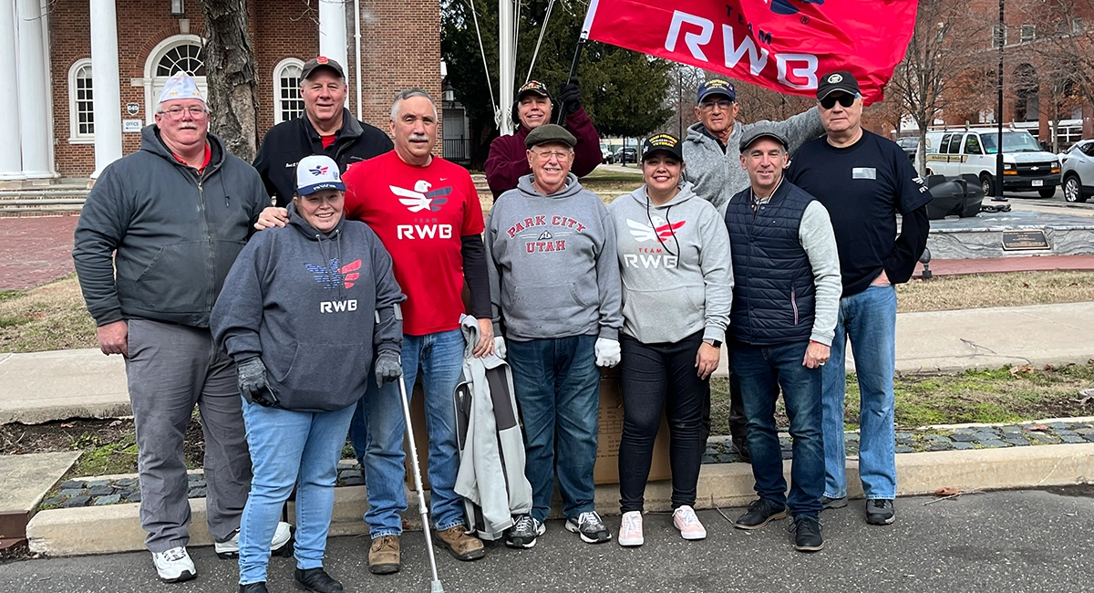 Representatives from Ocean State Job Lot, Bookwell Travel, and Project Freedom Villages were joined by members of Team Red, White, and Blue (Team RWB) and local volunteers to help pass out winter jackets to veterans and families in need. 