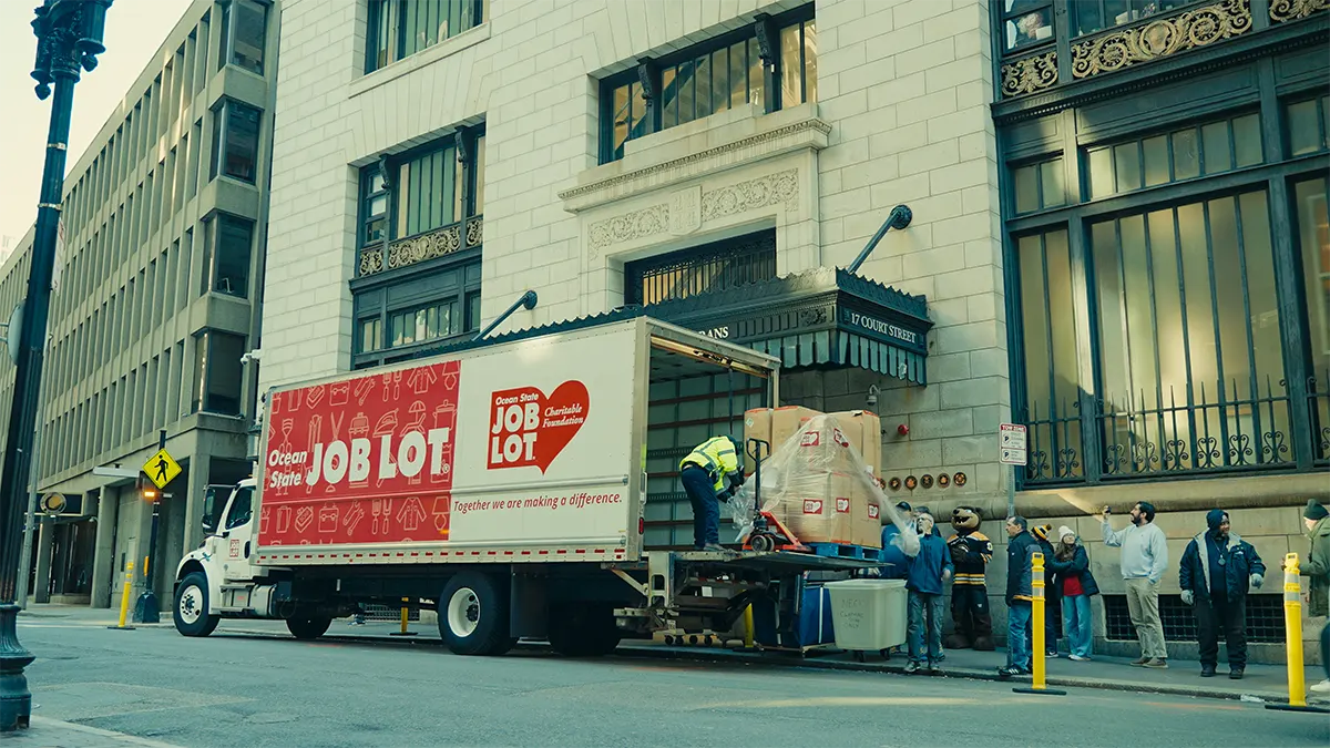 Ocean State Job Lot’s truck arrives at the New England Center and Home for Veterans to donate 800 warm winter coats.