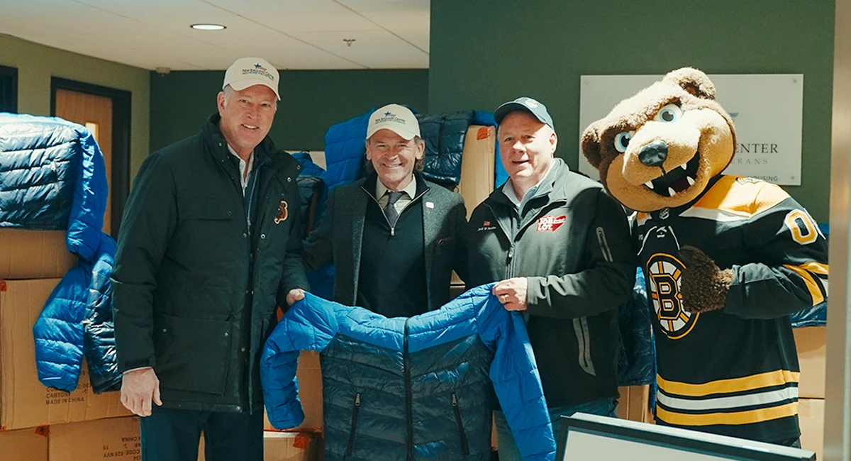 Bob Sweeney, Boston Bruins Foundation, and former Bruins player; C. Andrew McCawley, President and Chief Executive Officer, New England Center and Home for Veterans; David Sarlitto, Executive Director, Ocean State Job Lot Charitable Foundation; Blades the Bruins Mascot.